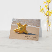 感謝祭の星の形のカボチャ(オレンジ色と黄色) - 海岸 カード (黄色い花)