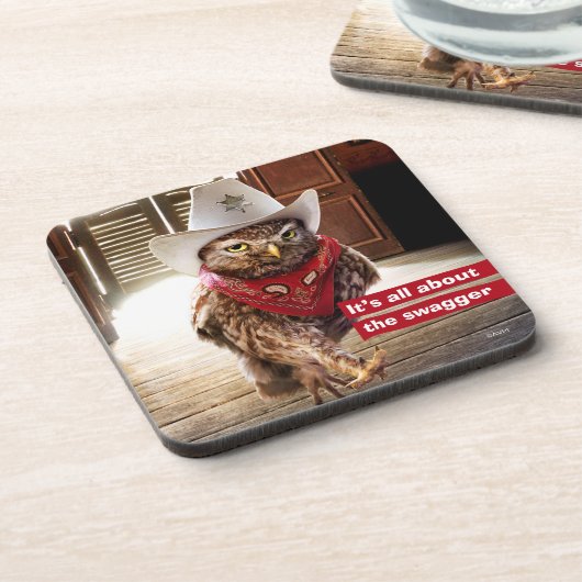 態度及び濶歩の堅い西部の保安官のフクロウ コースター (左側)