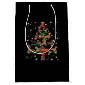 懐中電灯で覆われるダックシュントのクリスマスツリー ミディアムペーパーバッグ (正面)