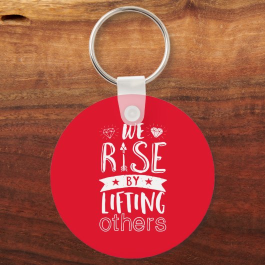 我々が感動的他の人を持ち上げることによって立ち上がる引用文 キーホルダー (正面)