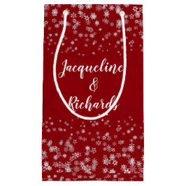 我々の初めてのクリスマススノーフレーク赤エレガントカスタム スモールペーパーバッグ