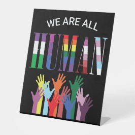 我々はみな人間の手カラフルだ 台座サイン