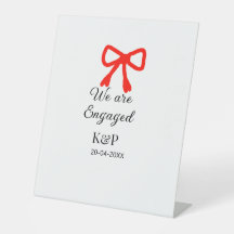 我々は名前婚約した文字の赤い弓のモダン文字を追加