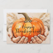 手が軽くカボチャの感謝祭を持つ シーズンカード (正面)
