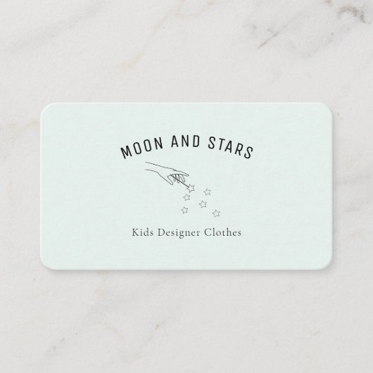 手にはモダン魔法の杖と星が生えていた。 名刺 (正面)