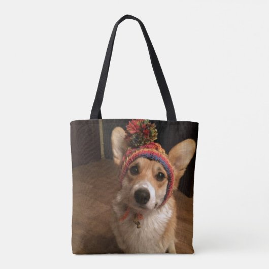 手によって編まれる帽子を身に着けているウェルシュコーギーのペンブローク トートバッグ (裏面)