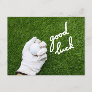 手にゴルフボールを持ってグリーンにGOOD LUCKの文字 ポストカード