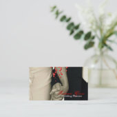 手のウェディングプランナーを握るカップル 名刺 (スタンド正面)