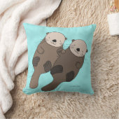 手の枕かわいいカワウソの装飾用クッションを握っているカワウソ クッション (ブランケット)