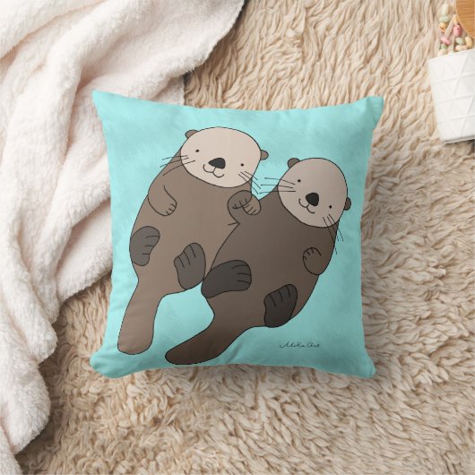 手の枕かわいいカワウソの装飾用クッションを握っているカワウソ クッション (ブランケット)