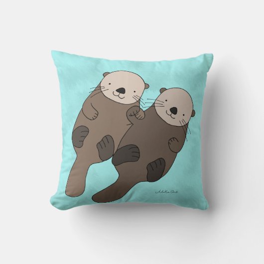 手の枕かわいいカワウソの装飾用クッションを握っているカワウソ クッション (正面)