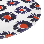 手の色彩の鮮やか花、赤と青のパターン。 カッティングボード (角)