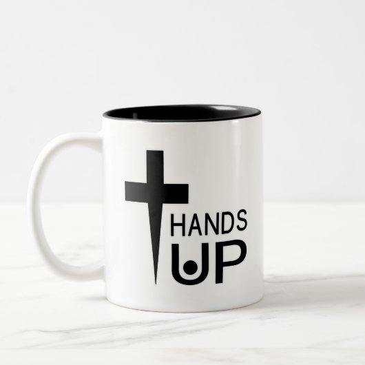 手を上げる ツートーンマグカップ (左)