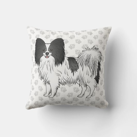 手を使った白黒のパピヨンの漫画の犬 クッション (裏面)