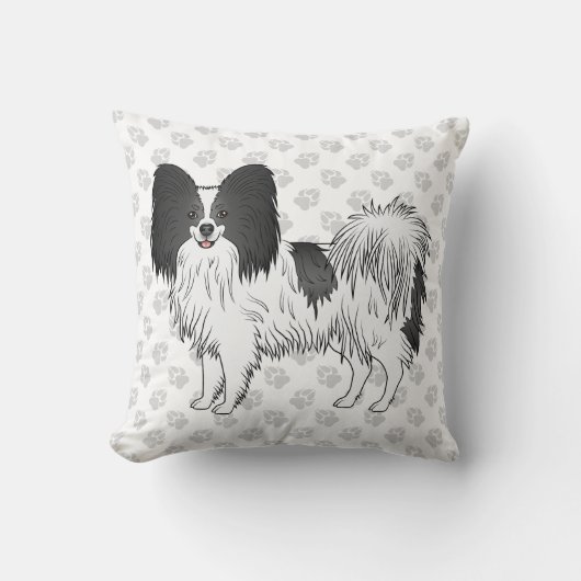 手を使った白黒のパピヨンの漫画の犬 クッション (正面)