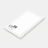 手を使った白黒のパピヨンの漫画の犬 ポストイット (アングル)