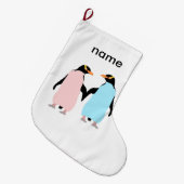 手を握っているペンギンとピンク。 ラージクリスマスストッキング (正面 (吊り時))
