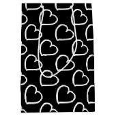 手描かわいらしきハートデザイン白の上に黒 ミディアムペーパーバッグ (正面)