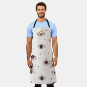 手描きの瞳は神秘的な継ぎ目のない模様。イビル・イ エプロン (着用した状態)