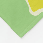 手描きの継ぎ目のない模様で、レモンが黄色で描かれています。 フリースブランケット (角)