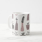手描きの継ぎ目のない模様で、黒、cの植物が描かれています。 コーヒーマグカップ (正面左)