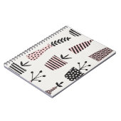 手描きの継ぎ目のない模様で、黒、cの植物が描かれています。 ノートブック (左側)