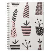 手描きの継ぎ目のない模様で、黒、cの植物が描かれています。 ノートブック (正面)