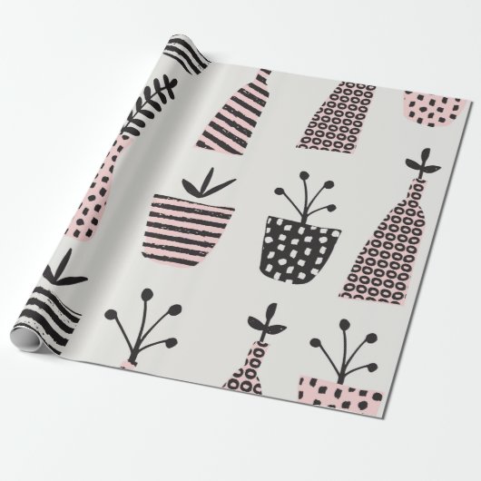 手描きの継ぎ目のない模様で、黒、cの植物が描かれています。 ラッピングペーパー (アンロールド)