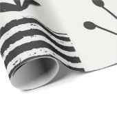 手描きの継ぎ目のない模様で、黒、cの植物が描かれています。 ラッピングペーパー (ロールコーナー)