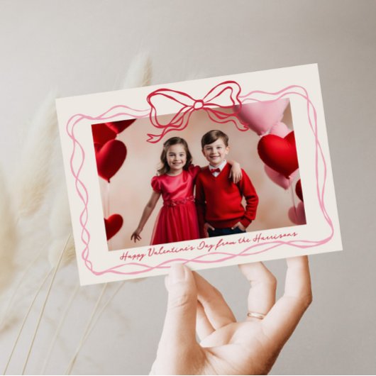 手描き赤とピンクの弓フレームバレンタインの日 シーズンカード