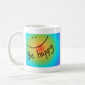 "手書き幸せな"カラフルな顔があって下さい コーヒーマグカップ (左)