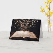 手紙と輝飛んでいるきのある本 カード (黄色い花)