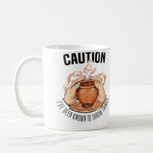 投げつけたがる人認定陶器 コーヒーマグカップ (左)