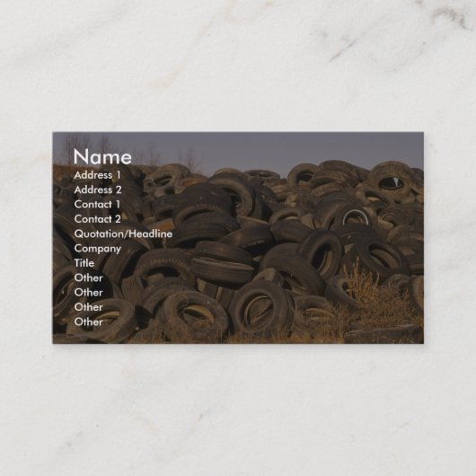 投げ出された古いタイヤ 名刺 (正面)