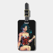 投げ疑問に思縄を岩の上に握る女性 ラゲッジタグ (正面縦)