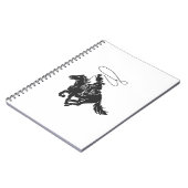 投げ縄で馬のランニングのカウボーイ ノートブック (左側)