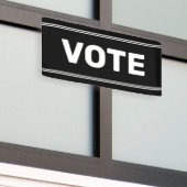 投票白黒文字 横断幕 (ビルの外側)