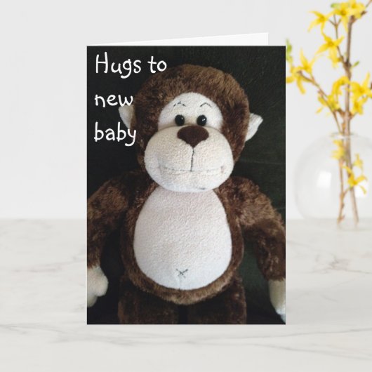 抱き締めて新生児 カード (黄色い花)