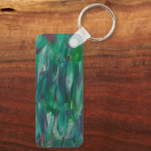 抽象的な緑と赤と白のカラフルなアート キーホルダー (裏面)