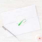 抽象的な緑のSwooshは背景を並べます ラウンドシール (封筒)