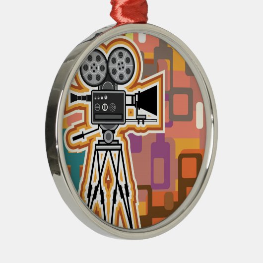 抽象的な背景の映写機のフィルムのカメラ メタルオーナメント (右)