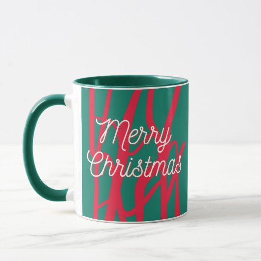 抽象的な赤と緑の個性的なメリークリスマス マグカップ (左)