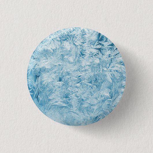 抽象的な青い羽と雪の結晶 缶バッジ (正面)