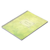 抽象的な《写真》ぼけ味の緑のライムの質。 名前 ノートブック (左側)