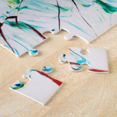 抽象芸術が緑の黄色い青で割れた ジグソーパズル (側面)