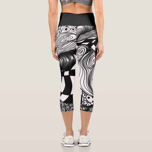 抽象芸術の黒線と白線絡 カプリレギンス (裏面)