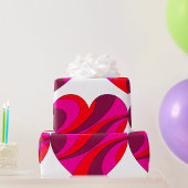 抽象芸術ハートはっきりした赤とピンクの旋回パターン ラッピングペーパー