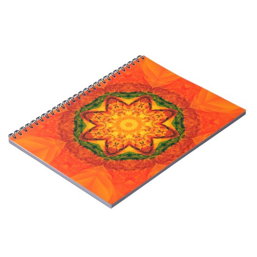 抽象芸術万華鏡のように千変万化するパターンオレンジの背景。美しい ノートブック (左側)