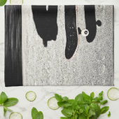 挟まれたスケートボード キッチンタオル (折り畳み)