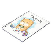 挟み込まれた子猫 ノートブック (左側)